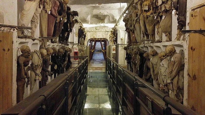 Corridor with mummies on the left and right