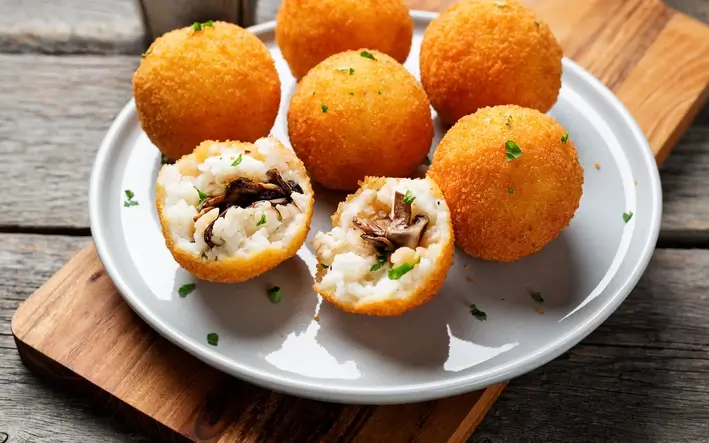 Sicilian rice balls Arrancini on a plate