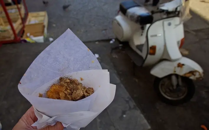 Veal innards frittola in a paper bag