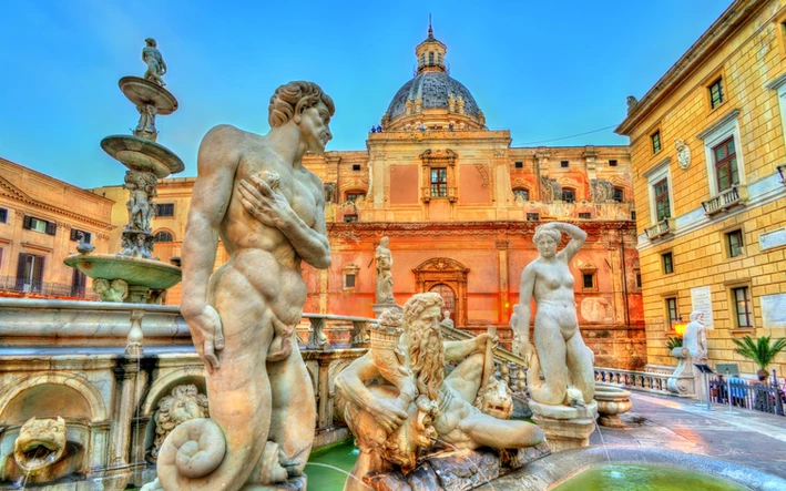 Statues of naked river gods and a nymph at the Fontana Pretoria