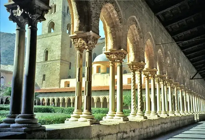 In the cloister of the former Benedictine monastery, visitors can admire the unique columns and the inner courtyard