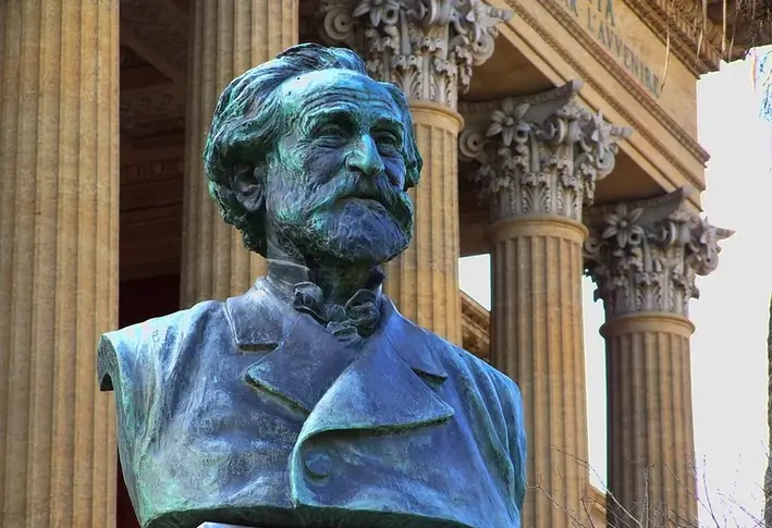 Close-up of the statue of Giuseppe Verdi in front of the Teatro Massimo