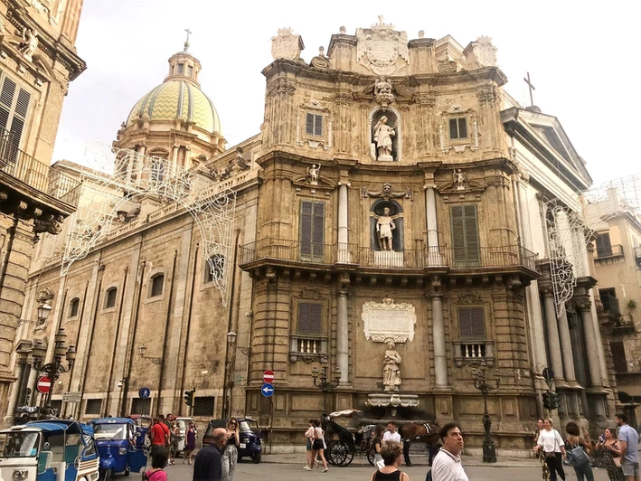 Tourists at the Quattro Canti intersection in Palermo