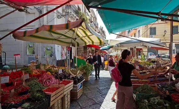 Woman at the stall at the Vucciria market