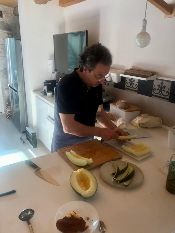 Eugenio the host prepares breakfast at BnB Dolcevita